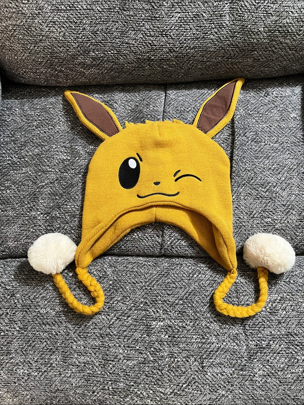 Pokemon Winking Eevee with Ears Beanie Hat with Pom-Pom Tassels